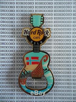 Hard Rock Cafe Oslo Viking Ship Guitar with HRC Logo Magnet Bottle Opener
