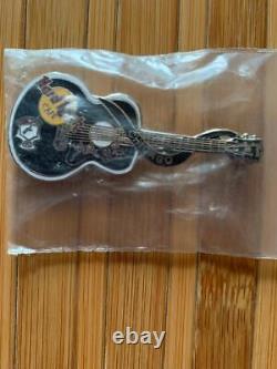 Hard Rock Cafe pins, collectively
