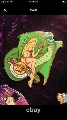 Hard Rock Hollywood Cafe Collector Pin set Of Four Dragons With Pretty Girl Pets