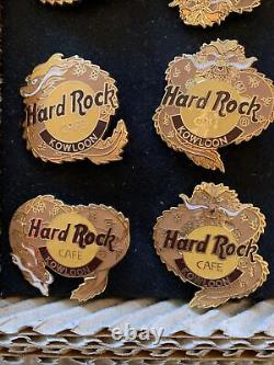 Coffret d'ouverture du Hard Rock Cafe de Kowloon 1994, comprenant 9 épingles de dragon rares, édition limitée à 500 exemplaires.
