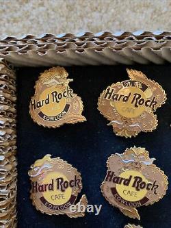 Coffret de 9 épingles de dragon rares édition limitée à 500 exemplaires de l'ouverture du Hard Rock Cafe de Kowloon en 1994.