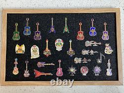 Collection de 27 épingles de guitare de la Maison des Blues à Las Vegas, Anaheim et San Diego.