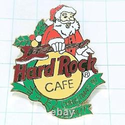 In French, the title would be: Épinglette de broche du Père Noël Hard Rock Cafe Pin Badge Z16718